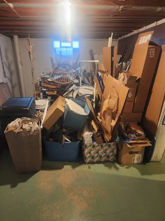 Roll-off dumpster container at job site for 15 Yard Dumpster Rental in Forest